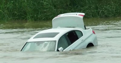 Man Pushes Brand New BMW In River Because He Wanted His Dad To Buy Him A Jaguar